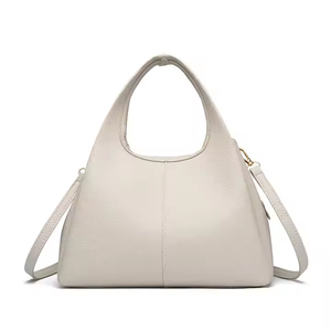 卸売高品質の本革の女性のショルダーバッグソフトカウハイドデザインクロワッサンバッグクロッサンムーンバッグ