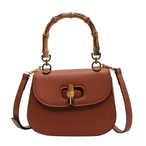 OEM New Spring and Summer Leather Bag Women's Delcled Bag高品質のテクスチャニッチデザインライトラグジュアリーレトロミニサドルバッグ